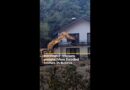 Excavator rescues people from flooded homes in Bosnia | AJ #shorts