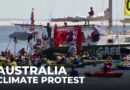 Australia climate protest: Police arrest 138 people after blocking ship