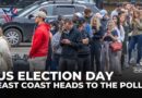 US East Coast voters head to polls as battleground states see record turnout