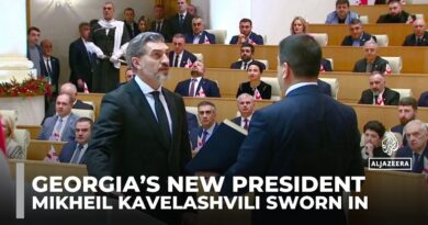 New Georgian president sworn in as predecessor refuses to stand aside