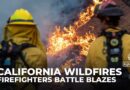 Firefighters race to contain LA wildfires as winds expected to pick up