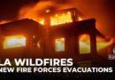 Five dead and thousands displaced as wildfires threaten Los Angeles area