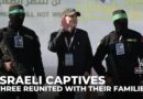 Israeli captives released: Three Israelis reunited with their families