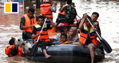 ‘All my belongings are gone’: floods in Indonesian capital displace thousands