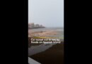 Car swept out to sea by floods on Spanish island