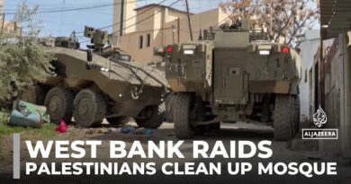 Palestinians clean up mosque after Israeli troops set it on fire during West Bank raids