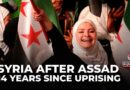 Syrians mark revolution anniversary with roses, songs and tight security