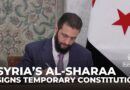 Syria’s al-Sharaa signs temporary constitution