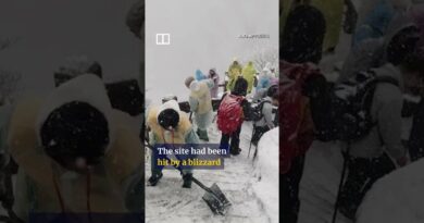 Tourist injured after slipping headfirst down snowy mountain trail in China #shorts