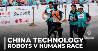 China hosts first-ever robots vs humans half-marathon in Beijing